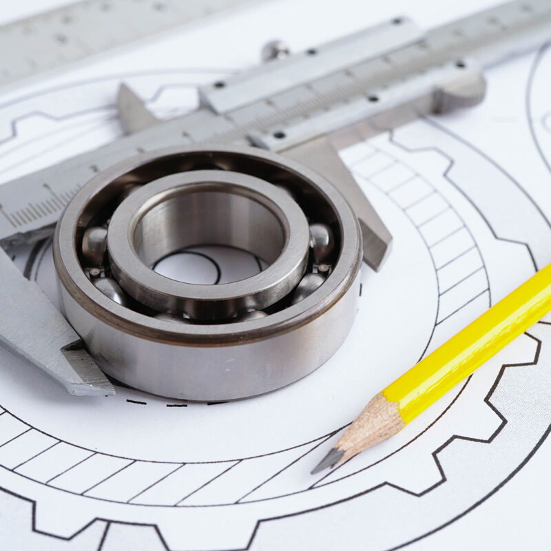 Engineering precision tools with metal ball bearing on a rendering